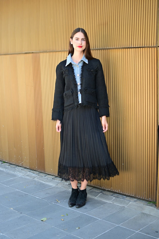 Falda plisada negra